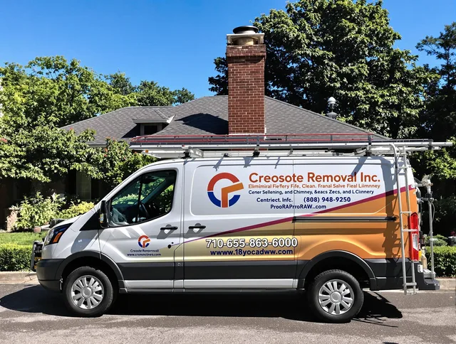 Newport Beach Chimney Sweep technician removing creosote safely in Newport Beach, CA